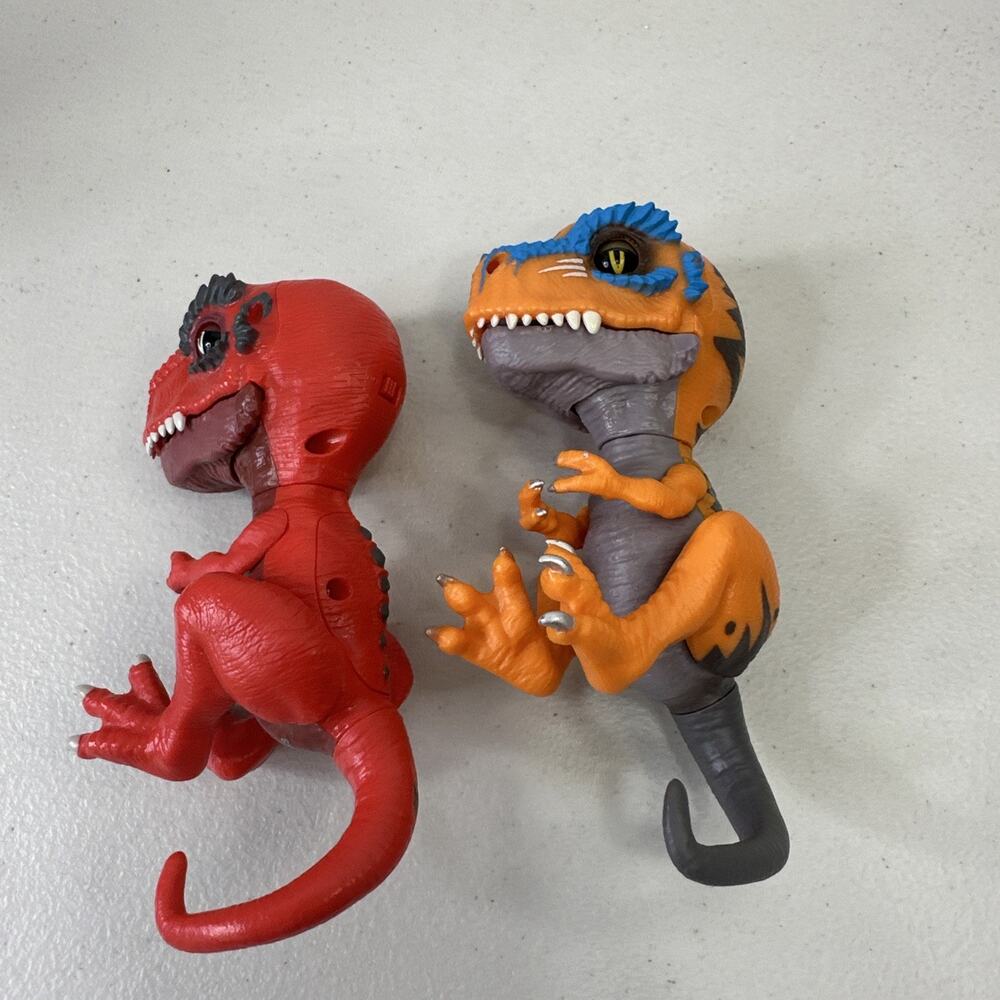 WowWee Untamed Fingerlings T-Rex Dinosaur Lot of 2 Red Ripsaw Orange Scratch